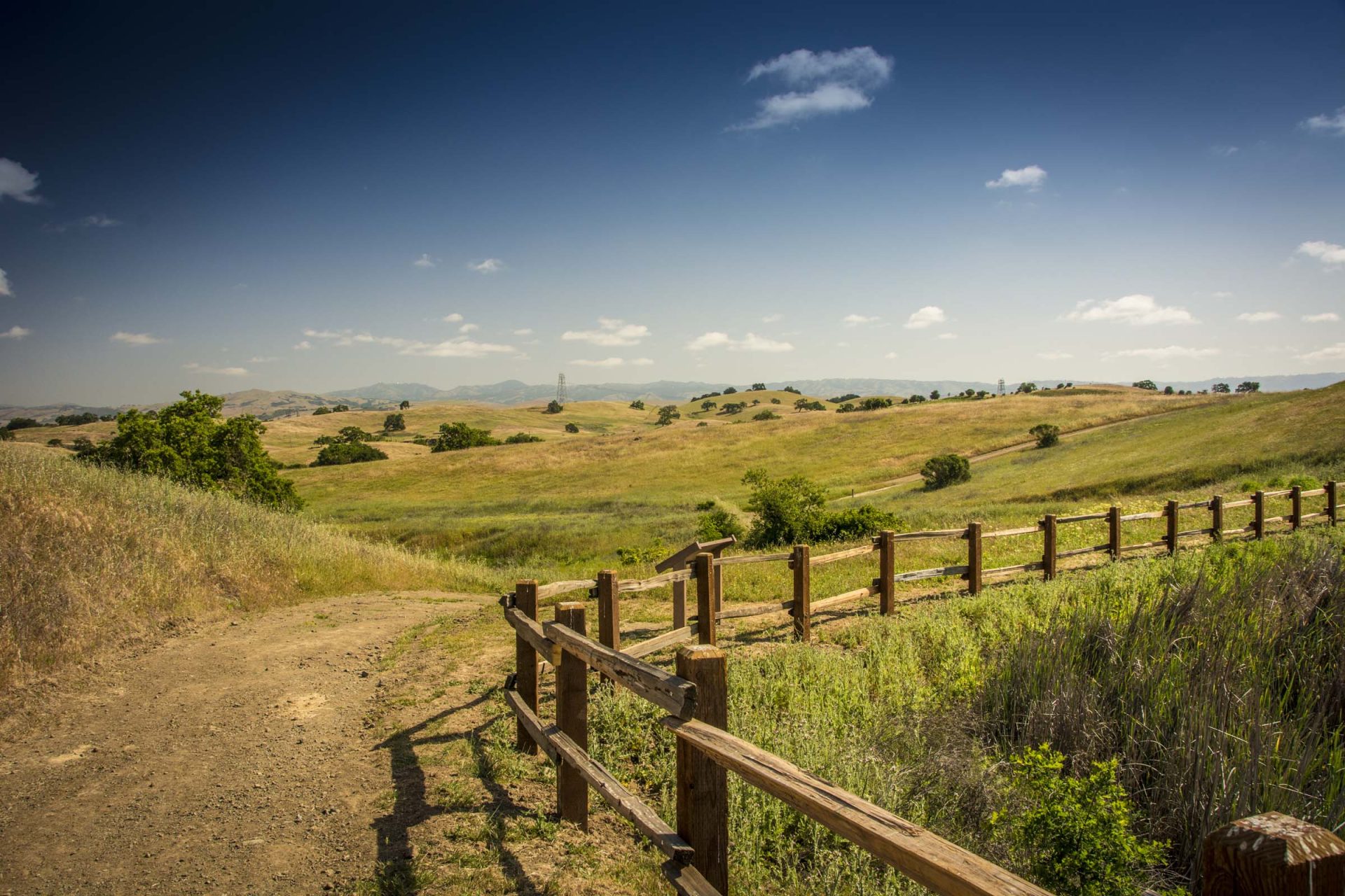Hillside view with wooden fence