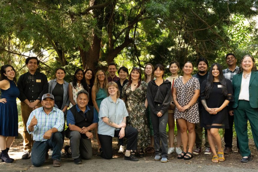 Leadership Program cohort 2025 PSR_250810_9822 cropped Leadership Program graduates, class of 2025, standing together under trees